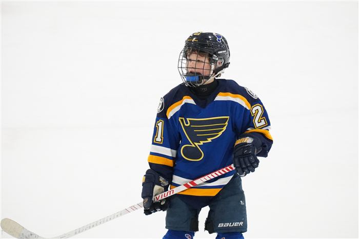 2014 AAA St Louis Blues player on the ice