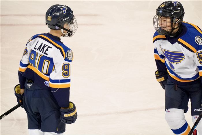 2014 AAA St Louis Blues players facing off