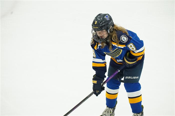 2014 AAA St Louis Blues players on the ice