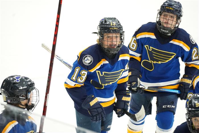 2014 AAA St Louis Blues player on the ice